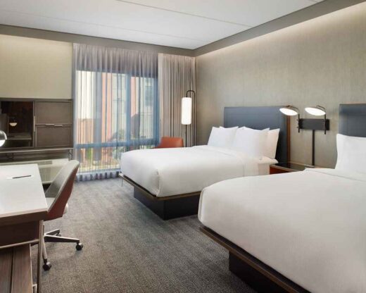 Spacious suite at an extended stay hotel in Covington GA with a fully equipped kitchen and comfortable living area.
